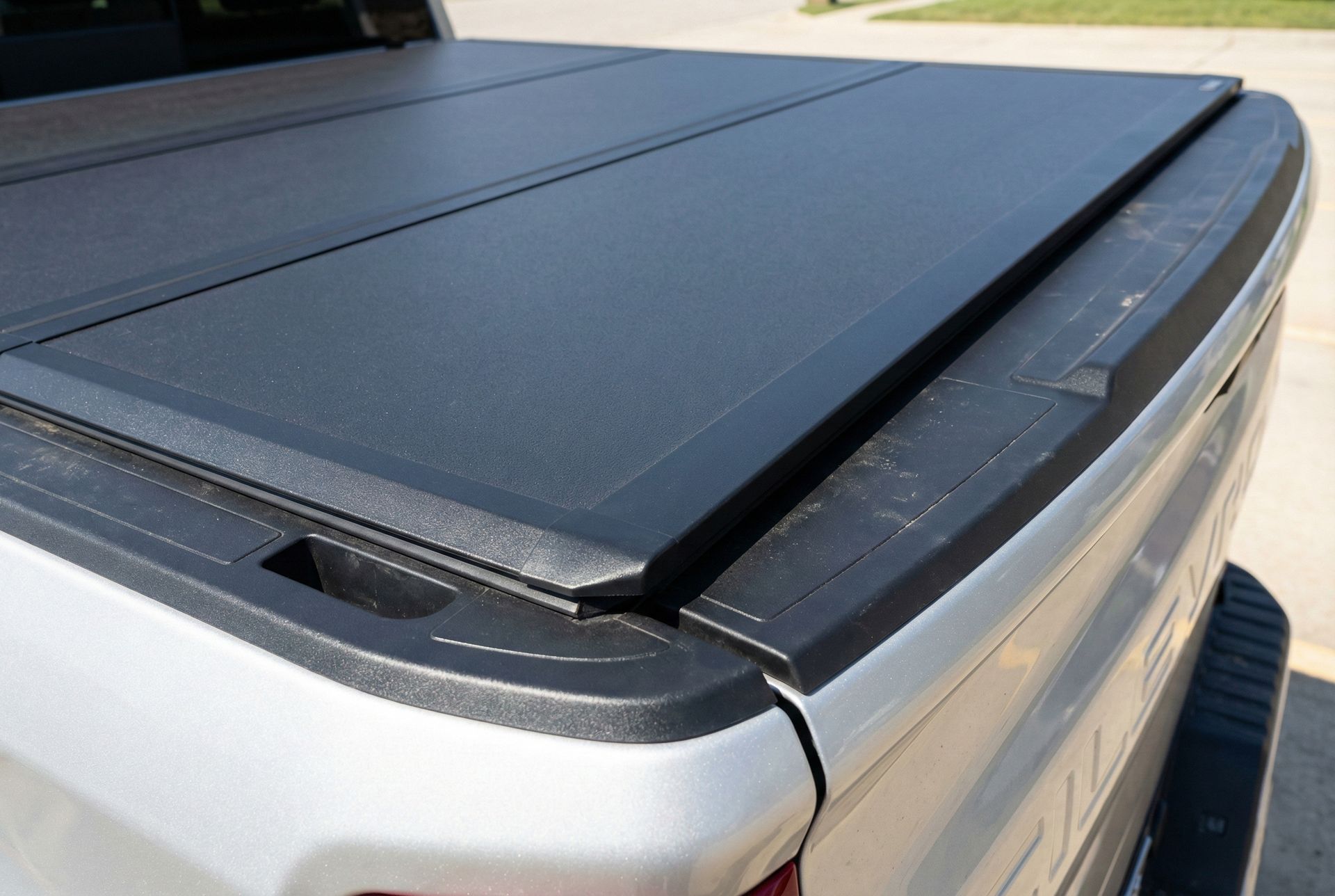 low-profile-quad-fold-tonneau-cover-flush-fit-silverado.jpeg